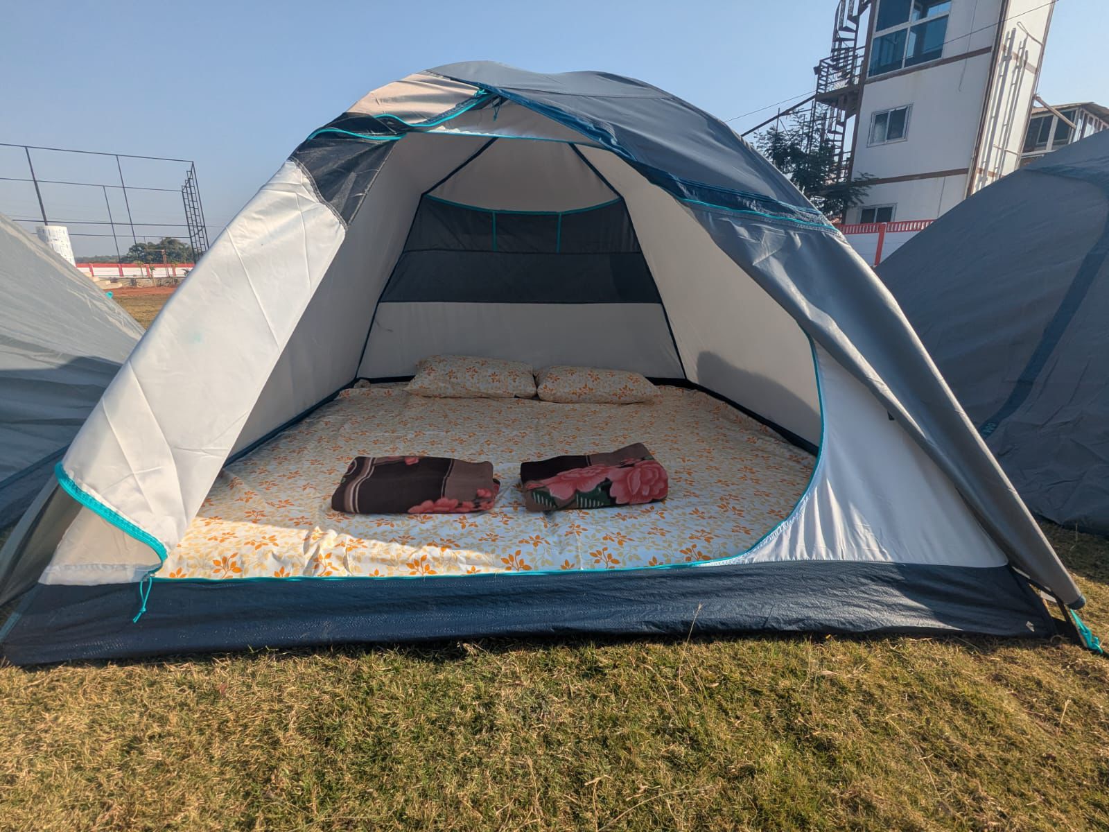 Inside a camping tent with bed