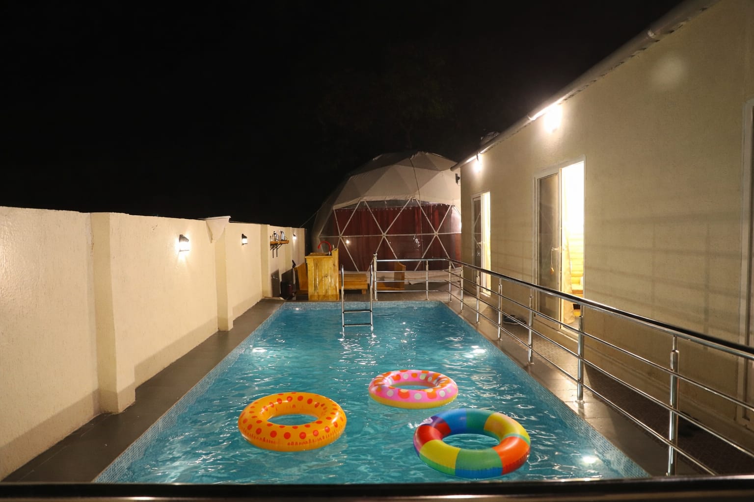 Private dome pool at night