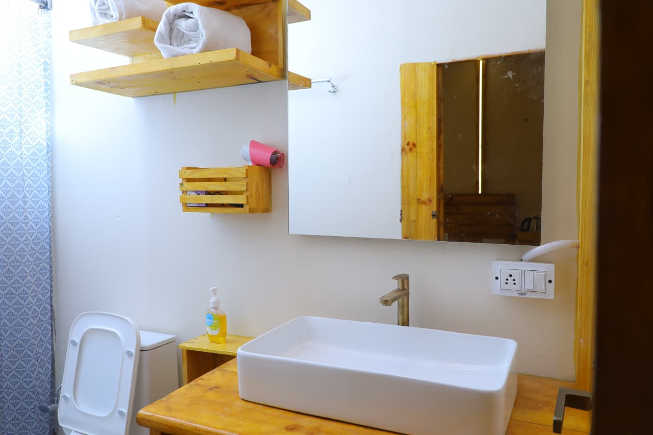 Bright bathroom with wooden vanity