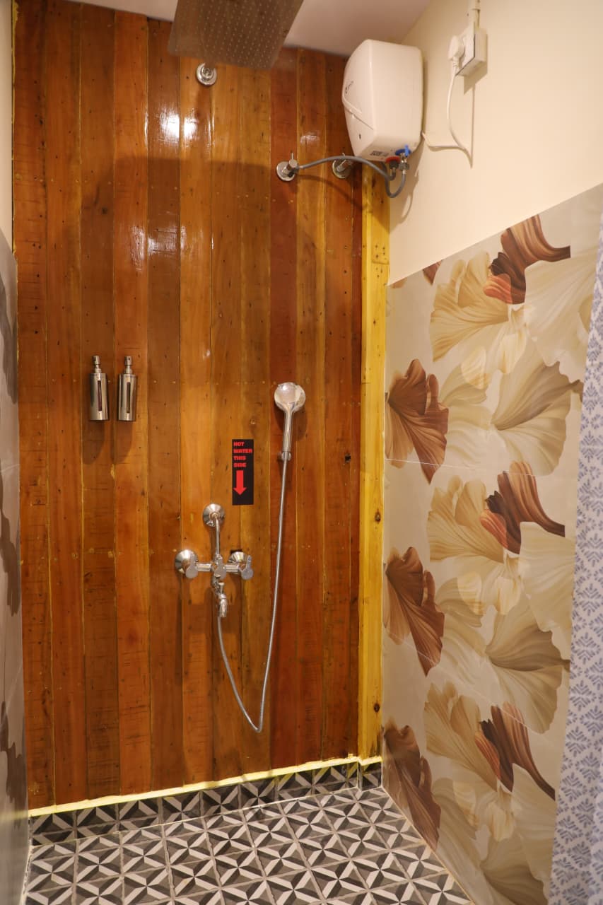 Wooden walled shower with hot water